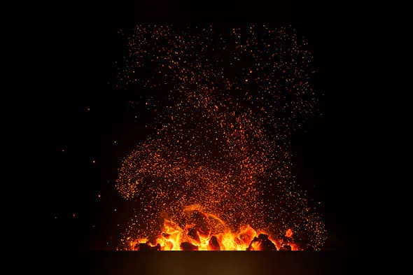 Intense Fire and Ember Texture with Floating Sparks on Black Background
