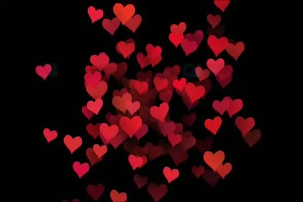 Falling Red Hearts Animation on Black Background