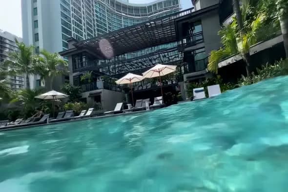 Luxury Resort Pool with Turquoise Waters and Modern Architecture