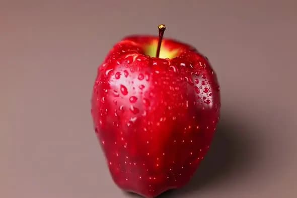 Fresh Red Apple with Water Droplets in Macro Shot