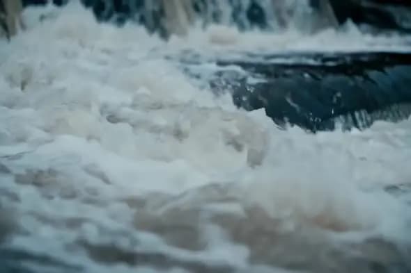 Turbulent Whitewater Rapids Close-up in Slow Motion