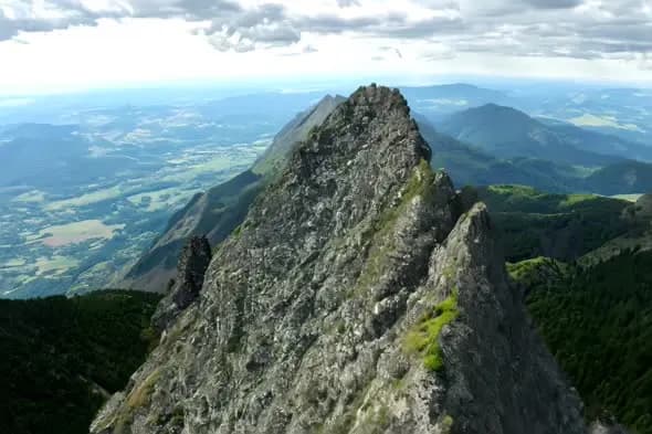 Majestic Rocky Mountain Peak with Dramatic Cloudy Sky