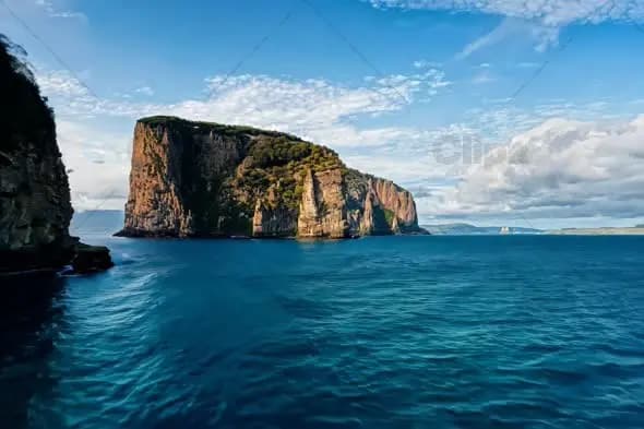 Majestic Coastal Cliffs Rising from Turquoise Ocean Waters