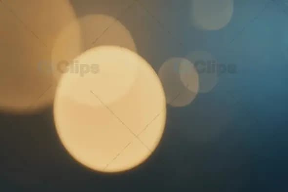 Elegant Bokeh Light Circles on Teal Background