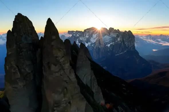 Dramatic Mountain Sunset Behind Dolomites Rock Formations