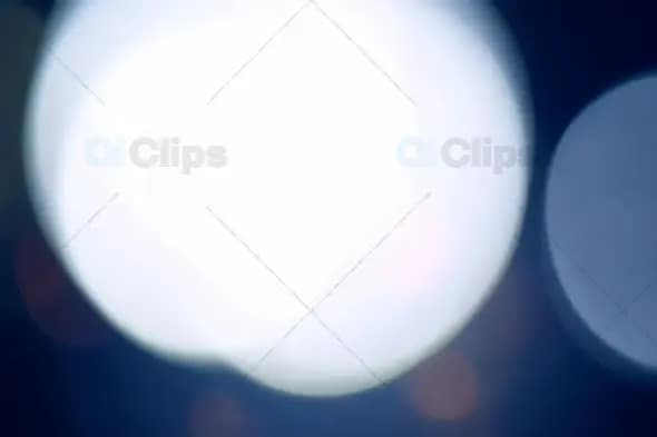 Ethereal Bokeh Light Orbs on Dark Blue Background