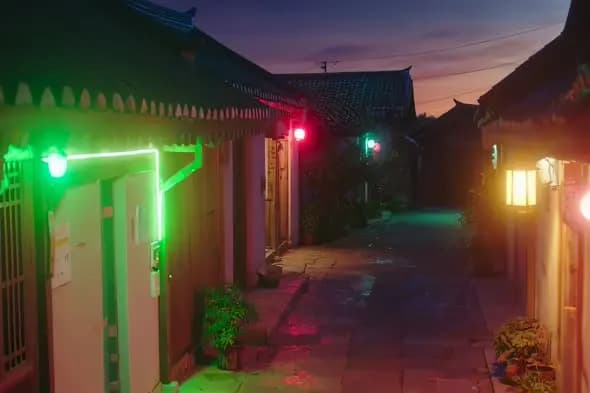 Traditional Asian Alley with Neon Lights at Dusk