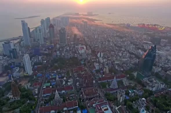 Aerial Cityscape of Mumbai Skyline During Golden Sunset