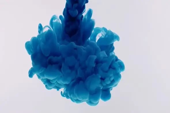 Ethereal Blue Ink Cloud Formation in Clear Liquid