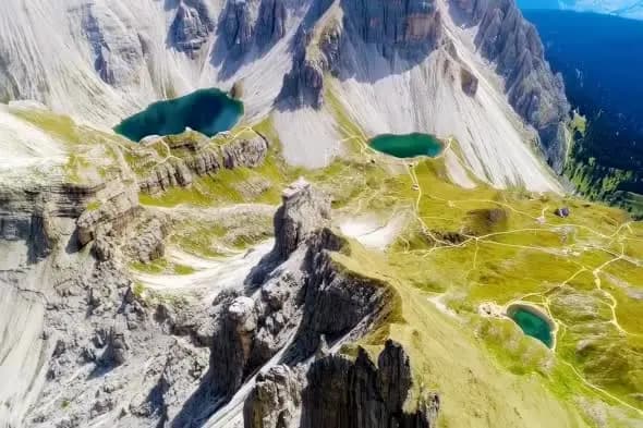 Aerial View of Alpine Lakes and Mountain Peaks in Dolomites
