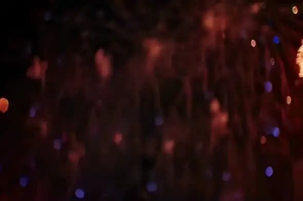 Abstract Bokeh Lights with Red and Purple Glow
