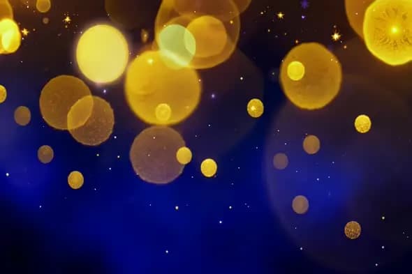 Golden Bokeh Orbs on Deep Blue Night Sky Background