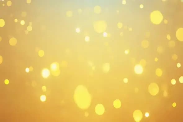 Elegant Golden Bookeh Background with Floating Light Particles