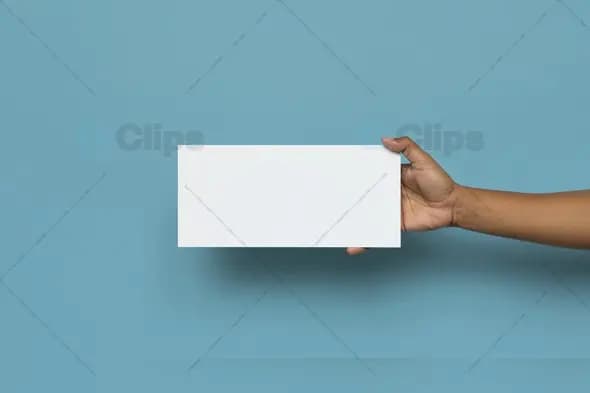 Minimalist Blank Card Held by Hand on Blue Background