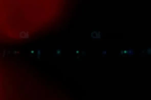 Abstract Bokeh Lights with Red Gradient Overlay