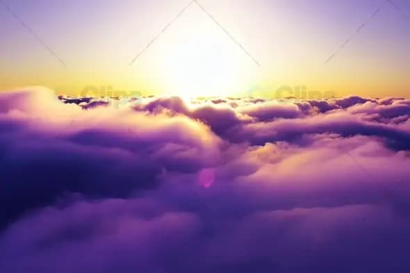 Majestic Sunset Above Purple Clouds Aerial View