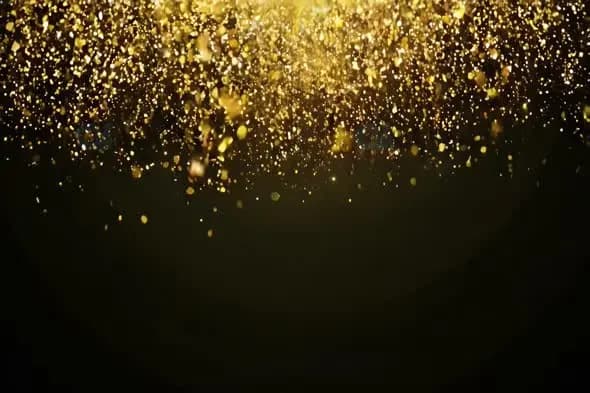 Luxurious Golden Glitter Particles Falling on Dark Background