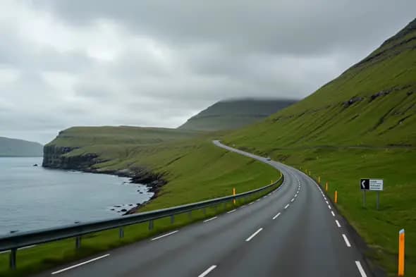 Coastal Highway Through Misty Mountains