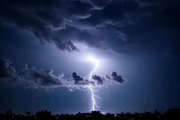 Electrifying Thunderstorm Over City