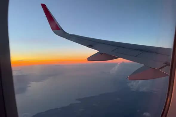 Sunrise View from Airplane Window
