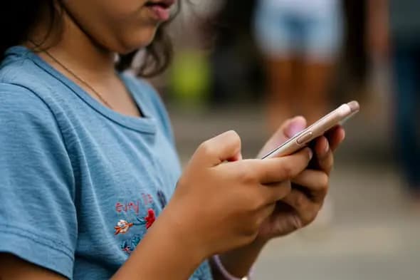 Child Engaging with Smartphone