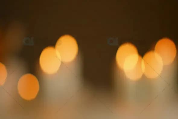 Warm Bokeh Candlelight on Dark Background