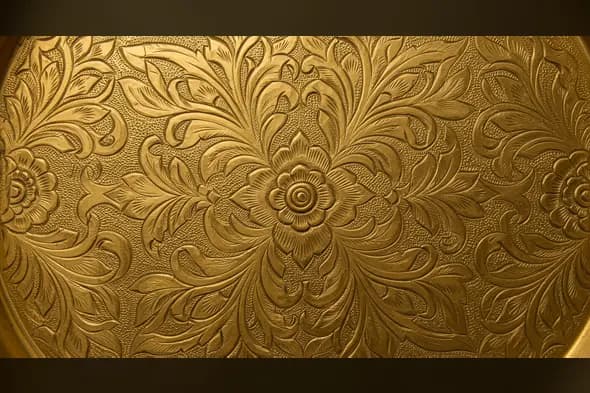Engraved Floral Gold Texture Background | Ornate Metal Surface Design
