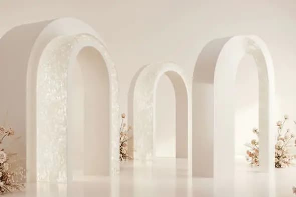 Minimal Pearl White Arched Wedding Decor with Floral Accents