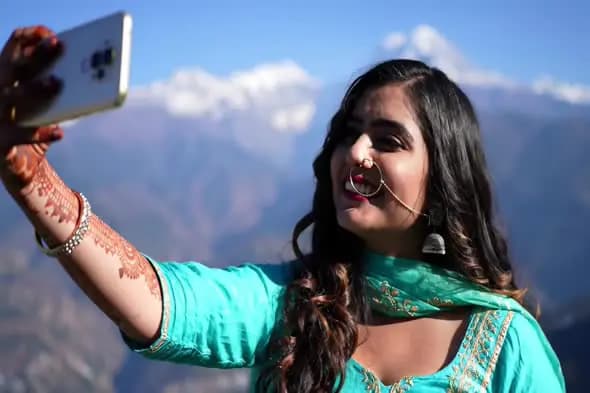 Mountain Selfie in Traditional Attire