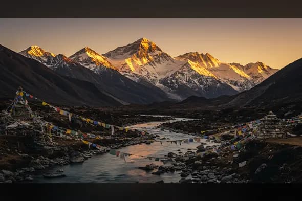 Sunrise over Himalayan Peaks with Prayer Flags by the River