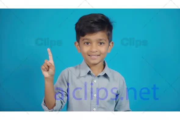 Smiling Young Boy Pointing Up