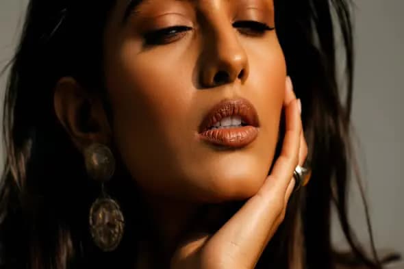 Elegant Close-Up of Woman with Statement Earrings