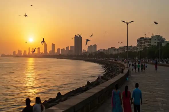 Sunset Over Marine Drive Mumbai with People Walking Along the Waterfront