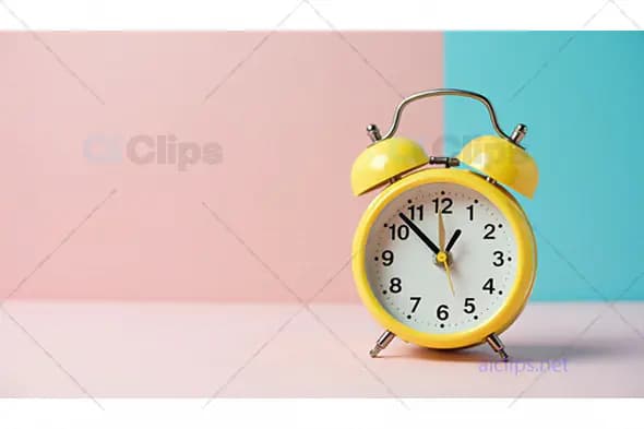 Yellow Alarm Clock on Pastel Background