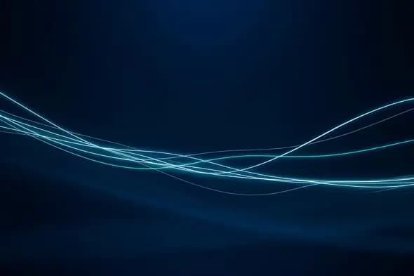 Glowing blue light streams on dark background