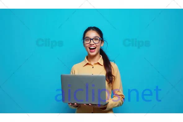 Excited Woman with Laptop