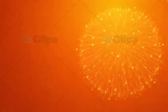 Golden Firework Burst on Orange Background 1