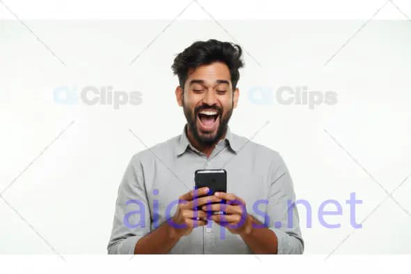 Excited Man Reacting to Smartphone