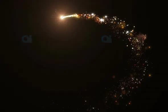 Golden Sparkling Comet Trail on Dark Background