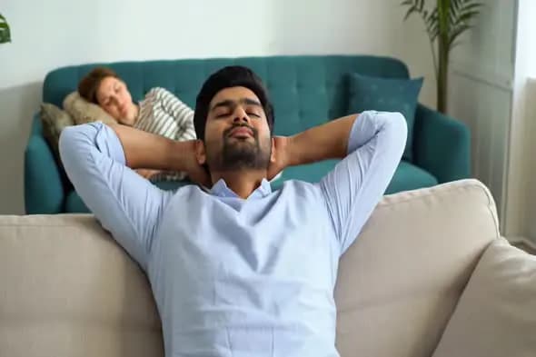 Relaxed Couple in Modern Living Room