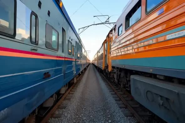 Parallel Trains on Tracks in Evening Light