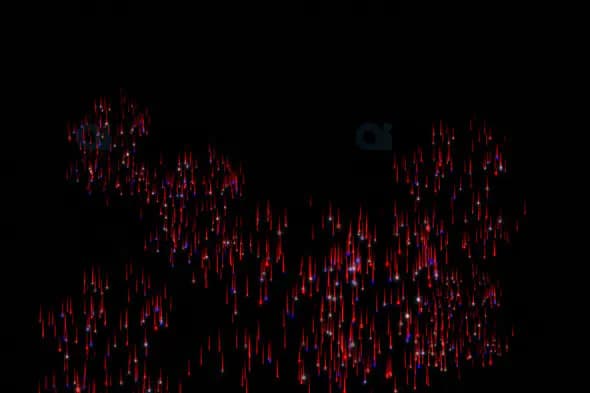 Falling Red and Blue Light Particles on Black Background