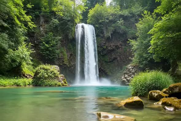 Majestic Waterfall Cascading into Turquoise Pool Scenic Nature