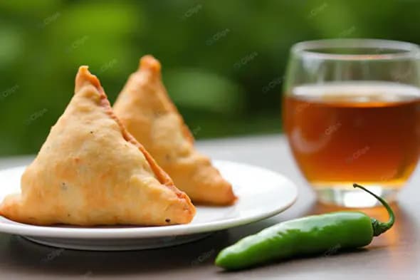 Samosa Appetizer with Chili and Beer