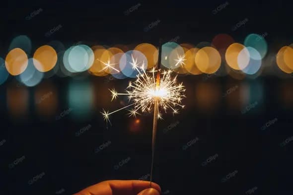 Glowing Sparkler with City Bokeh