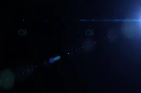 Blue Light Flare with Lens Reflections and Beam Effect