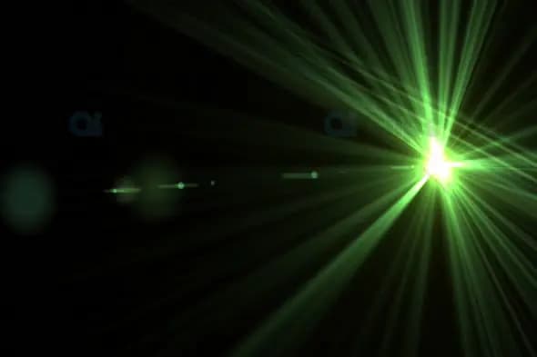 Radiant Green Light Flare with Beaming Light Streaks