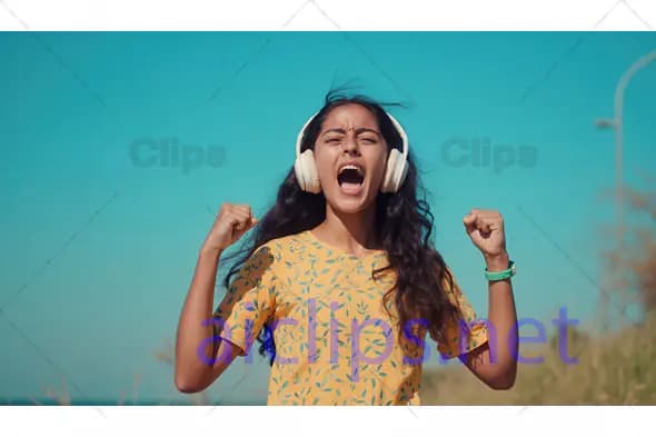 Excited Woman Listening to Music
