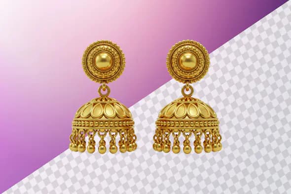 Golden jhumka earrings with intricate traditional design
