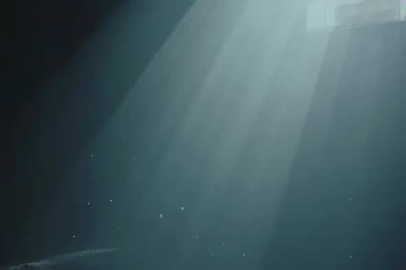 Ethereal Underwater Sunbeams Illuminating Mysterious Ocean Depths